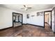 A spacious living room shows original hardwood floors and classic trim details at 3042 N Oxford St, Claremont, NC 28610