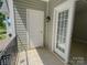 Balcony with white doors, tile flooring, and black iron railing at 4135 Twenty Grand Dr, Indian Trail, NC 28079