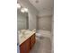 Well-lit bathroom featuring a tub shower and vanity with tile backsplash at 4135 Twenty Grand Dr, Indian Trail, NC 28079