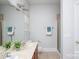Bathroom with a double sink vanity, large mirror, and a glass enclosed shower at 4135 Twenty Grand Dr, Indian Trail, NC 28079