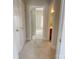 Bright hallway features neutral carpet, white doors, and access to multiple rooms at 4135 Twenty Grand Dr, Indian Trail, NC 28079