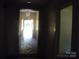 Bright hallway view with an open doorway and natural light streaming through the front door at 418 W Cemetery St, Salisbury, NC 28144
