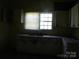 Kitchen with window and cabinets at 418 W Cemetery St, Salisbury, NC 28144