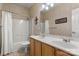 Bathroom with neutral walls, light wood cabinets and a bath tub and shower combination at 4389 Enchantment Cove Ln, Charlotte, NC 28216