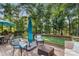 Inviting deck space with cozy wicker furniture, ideal for outdoor lounging at 4389 Enchantment Cove Ln, Charlotte, NC 28216
