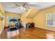 This exercise room has hardwood floors and plenty of room for workout equipment at 4389 Enchantment Cove Ln, Charlotte, NC 28216