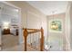 Bright foyer with chandelier and window, offering a view of the front entrance at 4389 Enchantment Cove Ln, Charlotte, NC 28216