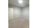 Well-lit bedroom with carpeted flooring, offering a simple canvas for personalization and relaxation at 4467 Antelope Ln, Charlotte, NC 28269