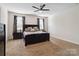Large main bedroom featuring a ceiling fan and carpeted floors at 4935 Norman Park Pl, Clover, SC 29710