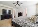 Well-lit main bedroom offering a large closet with hardwood flooring in the background at 4935 Norman Park Pl, Clover, SC 29710