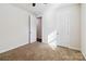 Clean bedroom featuring plush carpeting and multiple doors, allowing for ease of access at 4935 Norman Park Pl, Clover, SC 29710
