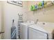 Well-organized laundry room with modern washer and dryer, along with ample storage space at 4935 Norman Park Pl, Clover, SC 29710