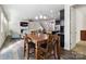 Open-concept living space featuring a kitchen, dining area, and cozy living room at 4935 Norman Park Pl, Clover, SC 29710