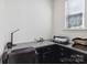 Office space featuring granite countertops, a desk, and natural light from the window at 4935 Norman Park Pl, Clover, SC 29710