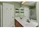 Modern bathroom featuring double vanity, stylish mirror, and ample lighting at 5011 Blue Stream Ln, Indian Trail, NC 28079
