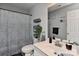 Clean bathroom with shower, mirror, and decorative towels at 5011 Blue Stream Ln, Indian Trail, NC 28079