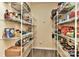 Walk-in pantry featuring an abundance of shelving, great for storing dry goods, cans, and more at 5011 Blue Stream Ln, Indian Trail, NC 28079
