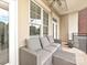 Cozy outdoor balcony with comfortable seating and views at 5425 Closeburn Rd, Charlotte, NC 28210