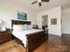 Bright bedroom boasts wood flooring, ceiling fan, and generous natural light at 5425 Closeburn Rd, Charlotte, NC 28210