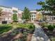 Beautiful condo building with manicured landscaping and ample parking at 5425 Closeburn Rd, Charlotte, NC 28210