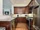 Well-appointed kitchen with stainless steel appliances, granite countertops, and ample cabinet space at 5425 Closeburn Rd, Charlotte, NC 28210