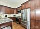 Modern kitchen equipped with stainless steel appliances, granite counters, and custom cabinetry at 5425 Closeburn Rd, Charlotte, NC 28210