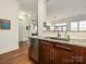 Gourmet kitchen with stainless steel appliances, granite countertops, and a convenient dishwasher at 5425 Closeburn Rd, Charlotte, NC 28210