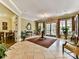 Spacious lobby with tile flooring, chandelier, and tastefully decorated seating area exudes sophistication at 5425 Closeburn Rd, Charlotte, NC 28210