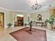 Elegant lobby featuring tile floors, chandelier, and sophisticated decor creates a welcoming atmosphere at 5425 Closeburn Rd, Charlotte, NC 28210