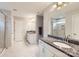 Bathroom with double sink vanity and glass shower enclosure at 5957 Redwood Pine Rd, Concord, NC 28027