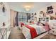 Bright bedroom with two twin beds, decor, and plush carpet at 5957 Redwood Pine Rd, Concord, NC 28027