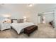 Bedroom with accent wall and ensuite bathroom at 5957 Redwood Pine Rd, Concord, NC 28027