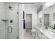 Modern bathroom with a glass-enclosed shower, white vanity, and stylish fixtures at 6019 Fonsac Ln # 2007A, Charlotte, NC 28217