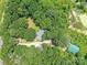 Aerial view of a home nestled within a dense forest, showcasing its secluded and private setting at 615 Hawley Rd, McConnells, SC 29726