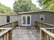 Home featuring a wooden deck with a backyard and grey siding at 615 Hawley Rd, McConnells, SC 29726