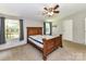 Bedroom with a large bed, neutral walls, and natural light from two windows at 615 Hawley Rd, McConnells, SC 29726