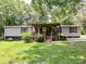 Charming single-story house with a covered porch and well-maintained lawn at 615 Hawley Rd, McConnells, SC 29726