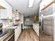 Bright kitchen with stainless steel appliances, granite countertops, and ample cabinet space at 615 Hawley Rd, McConnells, SC 29726