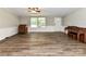 Spacious living room with wood-look floors, and lots of natural light at 615 Hawley Rd, McConnells, SC 29726