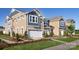 Charming new construction townhomes with two-car garages, professional landscaping at 6423 Mallow Crossing Ln, Charlotte, NC 28213