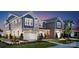 Charming new construction homes feature durable siding, manicured lawns, and attached two-car garages at 6423 Mallow Crossing Ln, Charlotte, NC 28213