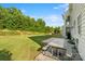 Expansive backyard with a well-kept lawn and a patio area, ideal for outdoor activities at 6430 Stirling Ln, Indian Land, SC 29707
