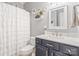 Bathroom with neutral walls, a vanity, and a shower/bath combo at 6430 Stirling Ln, Indian Land, SC 29707
