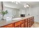 This is a luxurious bathroom with double sinks, a large mirror, and plenty of counter space at 6430 Stirling Ln, Indian Land, SC 29707