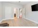 Bedroom with two entries, carpet, and a television at 6430 Stirling Ln, Indian Land, SC 29707