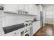 Bright eat-in kitchen featuring a workspace and stainless steel appliances and hardwood floors at 6430 Stirling Ln, Indian Land, SC 29707