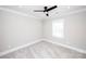 Comfortable carpeted bedroom with ceiling fan, recessed lighting, and a bright window at 720 Cavesson Way, Monroe, NC 28110