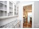 Butler's pantry with lots of storage space and countertop in this home at 720 Cavesson Way, Monroe, NC 28110