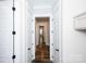 Hallway with hardwood flooring and views through multiple doorways at 720 Cavesson Way, Monroe, NC 28110