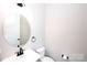 Powder room with modern fixtures at 720 Cavesson Way, Monroe, NC 28110